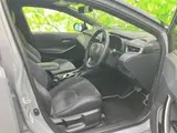 2025 Toyota Corolla Touring 4WD Hybrid Active Black Van for sale, Japanese used car export - photo 5 of 9 | GULJI TRADERS