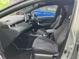 2025 Toyota Corolla Touring 4WD Hybrid Active Black Van for sale, Japanese used car export - photo 7 of 9 | GULJI TRADERS