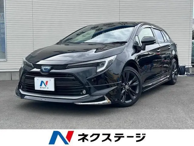 2025 Toyota Corolla Touring Hybrid Double By - photo 1 2025 Toyota Corolla Touring Hybrid Double By Black Van for sale, Japanese used car export - photo 1 of 9 | GULJI TRADERS