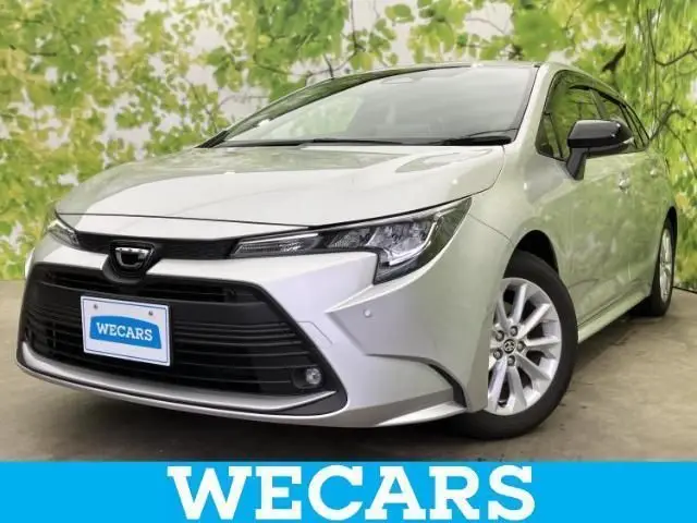 2025 Toyota Corolla Touring Hybrid G Silver Van for sale, Japanese used car export | GULJI TRADERS