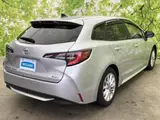 2025 Toyota Corolla Touring Hybrid G Silver Van for sale, Japanese used car export - photo 3 of 9 | GULJI TRADERS