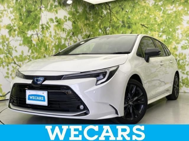 2025 Toyota Corolla Touring Hybrid - photo 1 2025 Toyota Corolla Touring Hybrid Van for sale, Japanese used car export - photo 1 of 9 | GULJI TRADERS