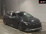 2025 Toyota Corolla Touring Hybrid Double By Black Van for sale, Japanese used car export - photo 1 of 9 | GULJI TRADERS