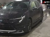 2025 Toyota Corolla Touring Hybrid Double By Black Van for sale, Japanese used car export - photo 7 of 9 | GULJI TRADERS