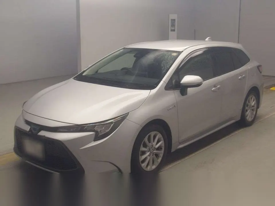 2020 Toyota Corolla Touring Push Start Hybrid S Silver Sedan for sale, Japanese used car export - photo 1 of 8 | GULJI TRADERS