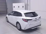 2023 Toyota Corolla Touring Wagon 4WD Touring Hybrid G Pearl Van for sale, Japanese used car export - photo 2 of 12 | GULJI TRADERS