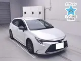 2023 Toyota Corolla Touring Wagon Touring Hybrid WxB Pearl Van for sale, Japanese used car export - photo 1 of 12 | GULJI TRADERS