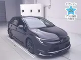 2023 Toyota Corolla Touring Wagon 4WD Touring Hybrid WxB Black Van for sale, Japanese used car export - photo 1 of 12 | GULJI TRADERS