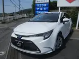 2025 Toyota Corolla Touring Wagon 4WD Touring Hybrid G Pearl Van for sale, Japanese used car export - photo 1 of 24 | GULJI TRADERS