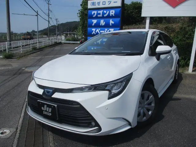 2025 Toyota Corolla Touring Wagon 4WD Touring Hybrid G Pearl Van for sale, Japanese used car export | GULJI TRADERS