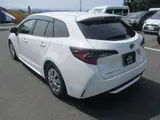 2025 Toyota Corolla Touring Wagon 4WD Touring Hybrid G Pearl Van for sale, Japanese used car export - photo 2 of 24 | GULJI TRADERS