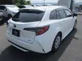 2025 Toyota Corolla Touring Wagon 4WD Touring Hybrid G Pearl Van for sale, Japanese used car export - photo 7 of 24 | GULJI TRADERS
