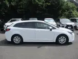 2025 Toyota Corolla Touring Wagon 4WD Touring Hybrid G Pearl Van for sale, Japanese used car export - photo 13 of 24 | GULJI TRADERS