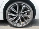 2021 Toyota Corollasport 1.8HYBRID G Z White Coupe for sale, Japanese used car export - photo 29 of 30 | GULJI TRADERS