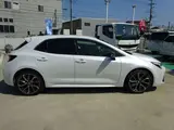 2025 Toyota Corollasport 1.8 Hybrid GZ White Coupe for sale, Japanese used car export - photo 13 of 43 | GULJI TRADERS
