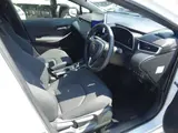 2025 Toyota Corollasport 1.8 Hybrid GZ White Coupe for sale, Japanese used car export - photo 33 of 43 | GULJI TRADERS