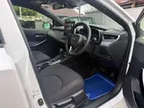 2025 Toyota Corollasport 1.8 Hybrid GZ White Coupe for sale, Japanese used car export - photo 40 of 67 | GULJI TRADERS