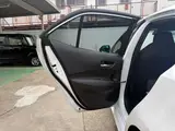 2025 Toyota Corollasport 1.8 Hybrid GZ White Coupe for sale, Japanese used car export - photo 56 of 67 | GULJI TRADERS