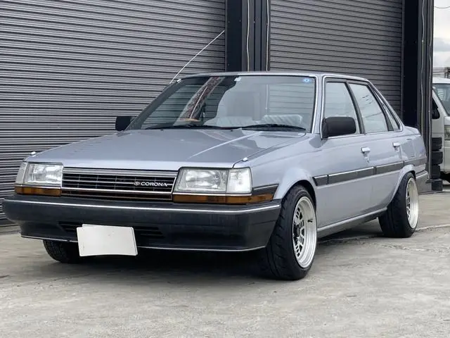1986 Toyota Corona 1.8GX - photo 1 1986 Toyota Corona 1.8GX Silver Sedan for sale, Japanese used car export - photo 1 of 31 | GULJI TRADERS