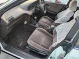 2002 Toyota Corona Exiv 2.0 FE White Sedan for sale, Japanese used car export - photo 31 of 69 | GULJI TRADERS