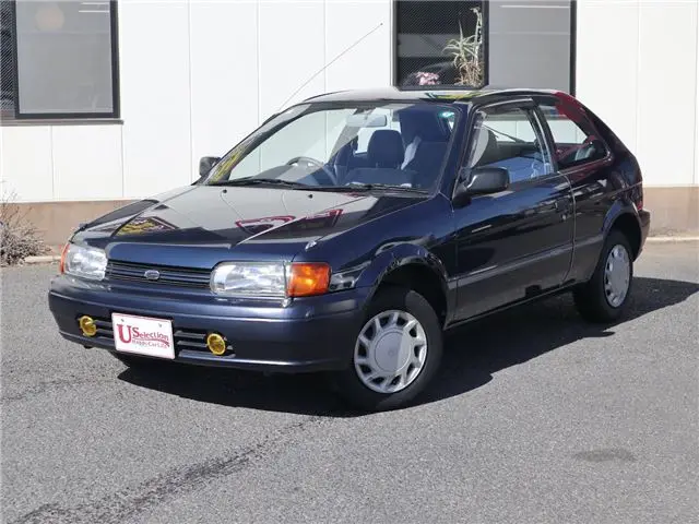 1995 Toyota Corsa Mower 4WD/5-speed MT/Fog lights/One owner/Timing belt replaced Blue Sedan for sale, Japanese used car export - photo 1 of 50 | GULJI TRADERS