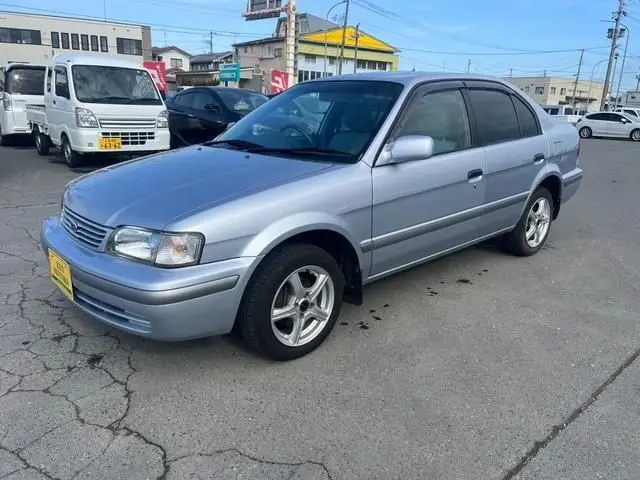 1999 Toyota Corsa AX Limited Silver Sedan for sale, Japanese used car export | GULJI TRADERS