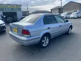 1999 Toyota Corsa AX Limited Silver Sedan for sale, Japanese used car export - photo 4 of 9 | GULJI TRADERS