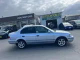 1999 Toyota Corsa AX Limited Silver Sedan for sale, Japanese used car export - photo 6 of 9 | GULJI TRADERS