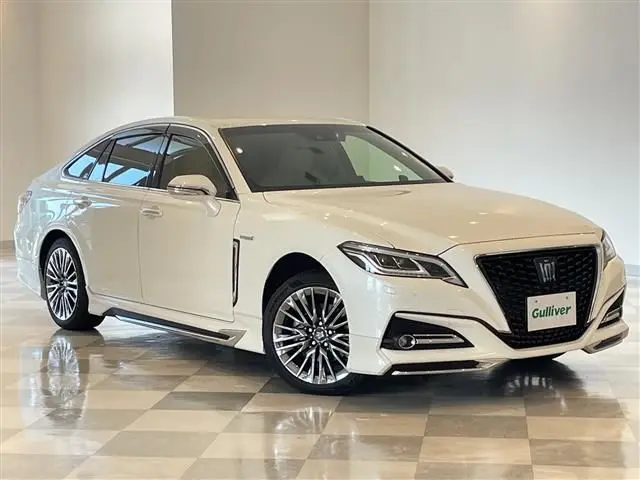 2019 Toyota Crown Hybrid G-Executive Four 4WD - photo 1 2019 Toyota Crown Hybrid G-Executive Four 4WD Pearl Sedan for sale, Japanese used car export - photo 1 of 24 | GULJI TRADERS