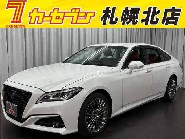 2021 Toyota Crown Hybrid G Four - photo 1 2021 Toyota Crown Hybrid G Four White Sedan for sale, Japanese used car export - photo 1 of 50 | GULJI TRADERS