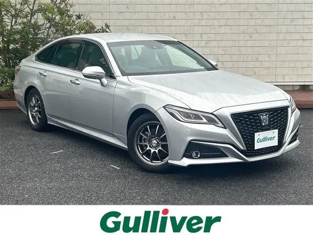 2021 Toyota Crown Hybrid G - photo 1 2021 Toyota Crown Hybrid G Silver Sedan for sale, Japanese used car export - photo 1 of 24 | GULJI TRADERS