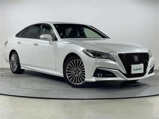 2021 Toyota Crown Hybrid S - photo 1 2021 Toyota Crown Hybrid S White Sedan for sale, Japanese used car export - photo 1 of 24 | GULJI TRADERS