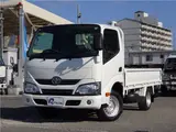 2019 Toyota Dyna Truck Flatbed truck, 1.25t load capacity, 10-foot length, standard, low-floor, manual transmission, gasoline engine. White Color changed Truck for sale, Japanese used car export - photo 1 of 46 | GULJI TRADERS