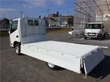 2019 Toyota Dyna Truck Flatbed truck, 1.25t load capacity, 10-foot length, standard, low-floor, manual transmission, gasoline engine. White Color changed Truck for sale, Japanese used car export - photo 22 of 46 | GULJI TRADERS