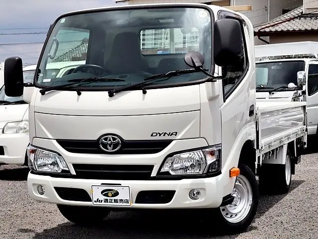 2019 Toyota Dyna Truck Flatbed truck, 1.5t load capacity, gross vehicle weight under 3.5t, compatible with new standard driver's license. White Truck for sale, Japanese used car export - photo 1 of 39 | GULJI TRADERS