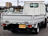 2019 Toyota Dyna Truck Flatbed truck, 1.5t load capacity, gross vehicle weight under 3.5t, compatible with new standard driver's license. White Truck for sale, Japanese used car export - photo 2 of 39 | GULJI TRADERS