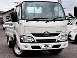 2019 Toyota Dyna Truck Flatbed truck, 1.5t load capacity, gross vehicle weight under 3.5t, compatible with new standard driver's license. White Truck for sale, Japanese used car export - photo 4 of 39 | GULJI TRADERS