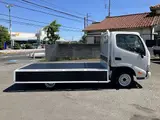 2019 Toyota Dyna Truck 1.45t load capacity, flatbed truck, standard driver's license required, 5-speed manual transmission, low-floor truck. White Truck for sale, Japanese used car export - photo 12 of 46 | GULJI TRADERS