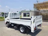 2019 Toyota Dyna Truck Flatbed, vertical power loading, 2-ton capacity, low-floor, manual transmission, diesel engine. White Truck for sale, Japanese used car export - photo 2 of 51 | GULJI TRADERS