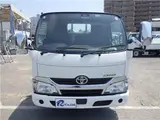 2019 Toyota Dyna Truck Flatbed, vertical power loading, 2-ton capacity, low-floor, manual transmission, diesel engine. White Truck for sale, Japanese used car export - photo 4 of 51 | GULJI TRADERS