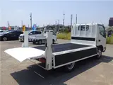 2019 Toyota Dyna Truck Flatbed, vertical power loading, 2-ton capacity, low-floor, manual transmission, diesel engine. White Truck for sale, Japanese used car export - photo 22 of 51 | GULJI TRADERS