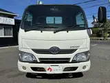 2019 Toyota Dyna Truck 1.5t capacity, flatbed truck, standard driver's license required, steel bed floor, 5-speed manual transmission. White Truck for sale, Japanese used car export - photo 2 of 45 | GULJI TRADERS