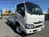2019 Toyota Dyna Truck 1.5t capacity, flatbed truck, standard driver's license required, steel bed floor, 5-speed manual transmission. White Truck for sale, Japanese used car export - photo 3 of 45 | GULJI TRADERS