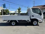 2019 Toyota Dyna Truck 1.5t capacity, flatbed truck, standard driver's license required, steel bed floor, 5-speed manual transmission. White Truck for sale, Japanese used car export - photo 5 of 45 | GULJI TRADERS