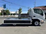 2019 Toyota Dyna Truck 1.5t capacity, flatbed truck, standard driver's license required, steel bed floor, 5-speed manual transmission. White Truck for sale, Japanese used car export - photo 12 of 45 | GULJI TRADERS
