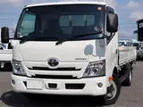 2020 Toyota Dyna Truck Flatbed, 2-ton load capacity, wide long, low-floor, gross vehicle weight less than 5 tons. White Truck for sale, Japanese used car export - photo 1 of 6 | GULJI TRADERS