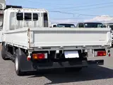 2020 Toyota Dyna Truck Flatbed, 2-ton load capacity, wide long, low-floor, gross vehicle weight less than 5 tons. White Truck for sale, Japanese used car export - photo 2 of 6 | GULJI TRADERS