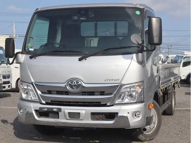 2020 Toyota Dyna Truck Flatbed truck, 1.8t load capacity, wide long, low-floor design, steel plate bed. Silver Truck for sale, Japanese used car export - photo 1 of 6 | GULJI TRADERS