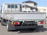 2020 Toyota Dyna Truck Flatbed truck, 1.8t load capacity, wide long, low-floor design, steel plate bed. Silver Truck for sale, Japanese used car export - photo 2 of 6 | GULJI TRADERS