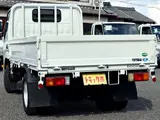 2020 Toyota Dyna Truck Flatbed, 2-ton load capacity, standard 10-foot body, low-floor design, gross vehicle weight less than 5 tons. White Truck for sale, Japanese used car export - photo 5 of 42 | GULJI TRADERS
